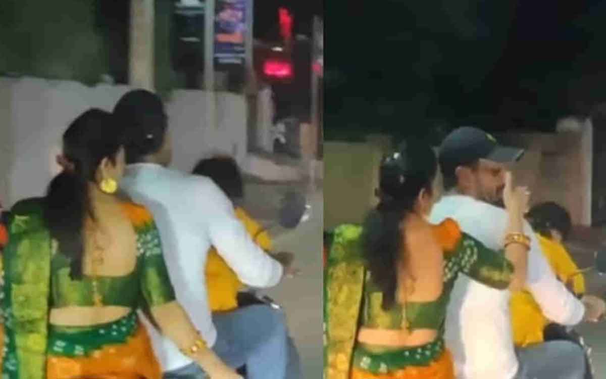 women helping her husband to smoke cigarette 